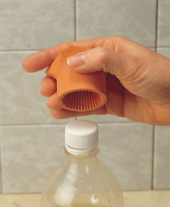 Bottle Opener and Knob Turner in use